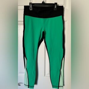 2013 Lululemon Run: Pace Tight, green/black, size 8 - excellent used condition.